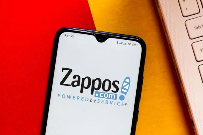 The logo of Amazon's Zappos as a screen lock